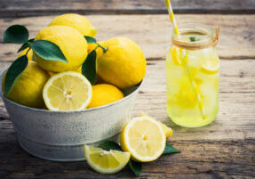 Fresh lemons and lemonade